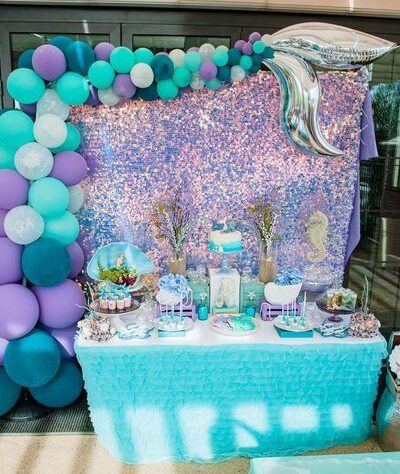 Enchanting Mermaid Tail & Shimmering Sequin Backdrop Display